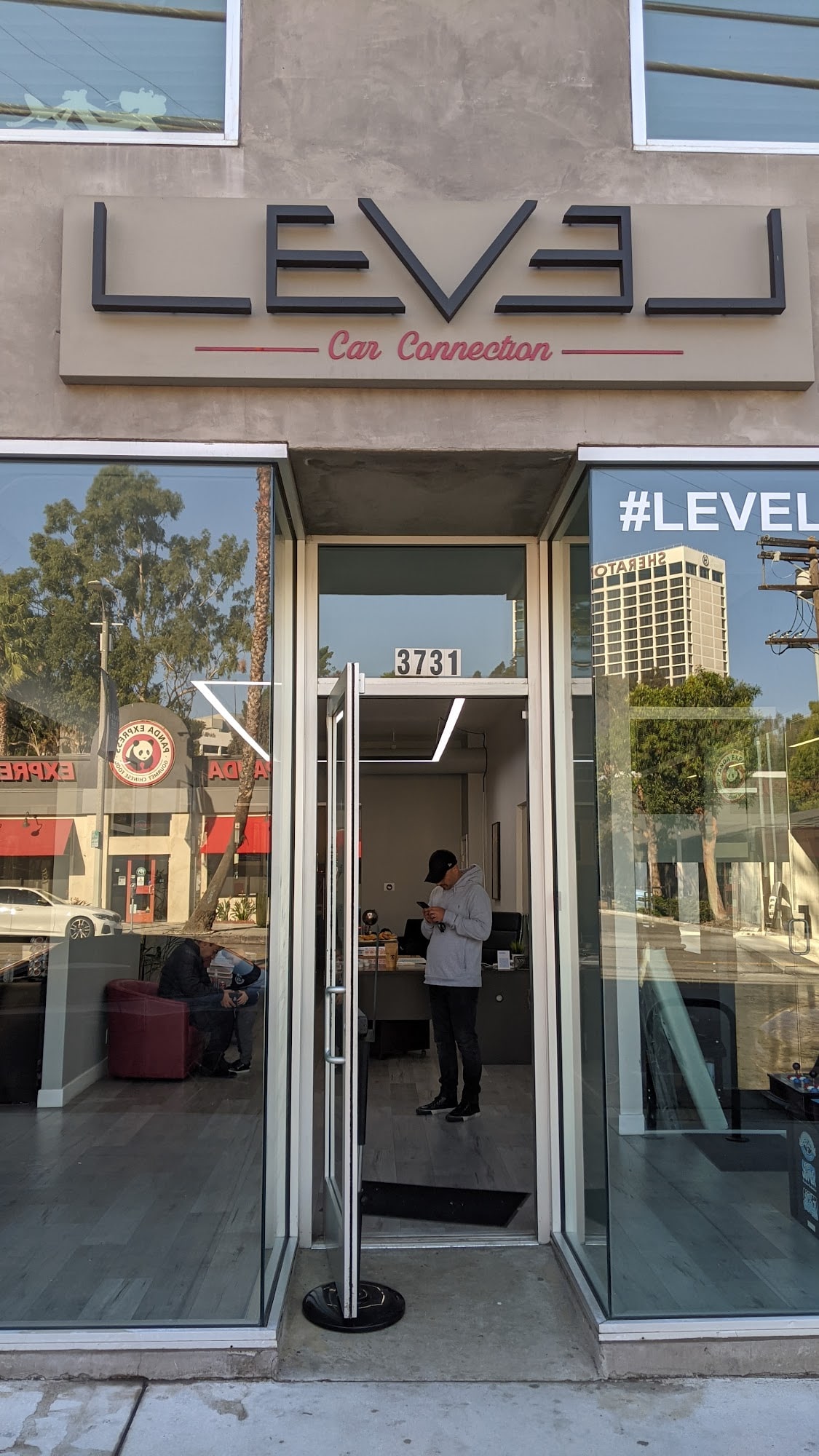 Entrance to the LEVEL Car Connection storefront